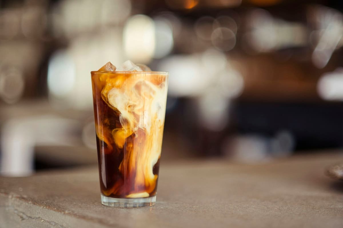 Iced cold coffee in a tall glass